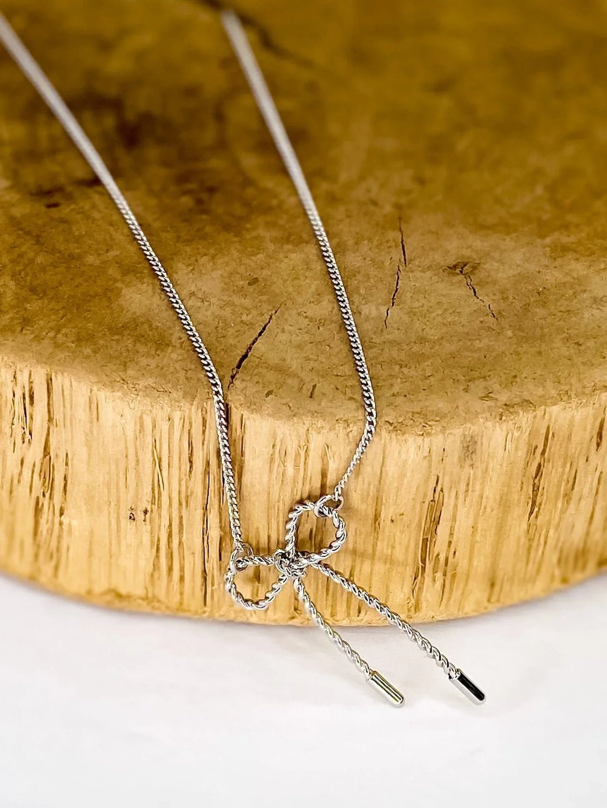Necklaces Dainty Bow Necklace 16in- Silver